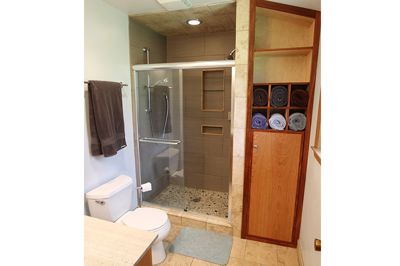 Brown Deer bathroom with travertine tile
